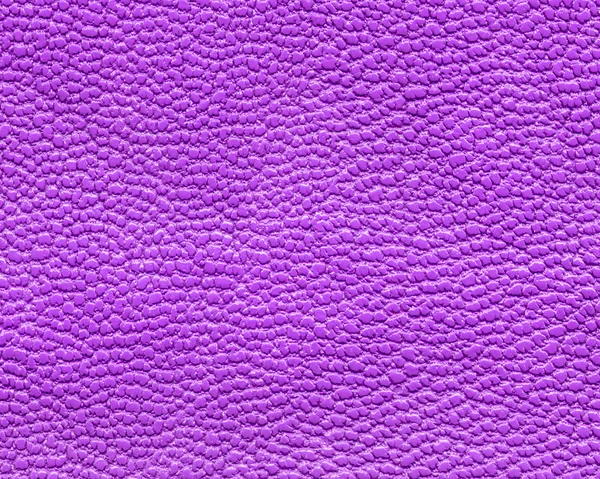 Фиолетовая искусственная кожаная текстура в качестве фона — стоковое фото