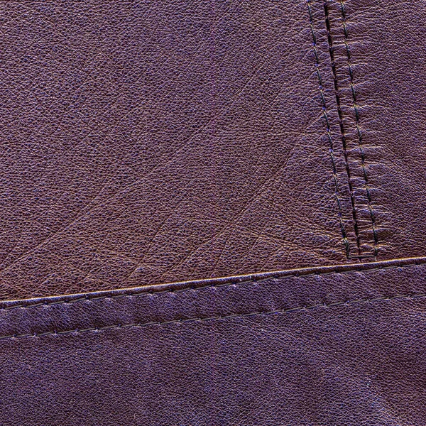 Fondo de cuero violeta decorado con costuras —  Fotos de Stock