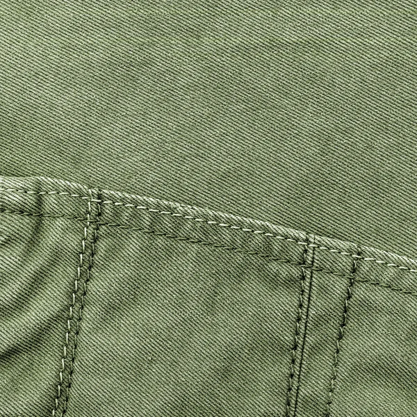 Green jean texture, seams,stitches — Stock Photo, Image