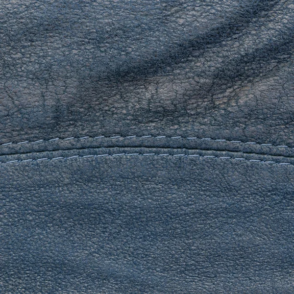 Blauwe gelooid leder texture versierd met naad — Stockfoto