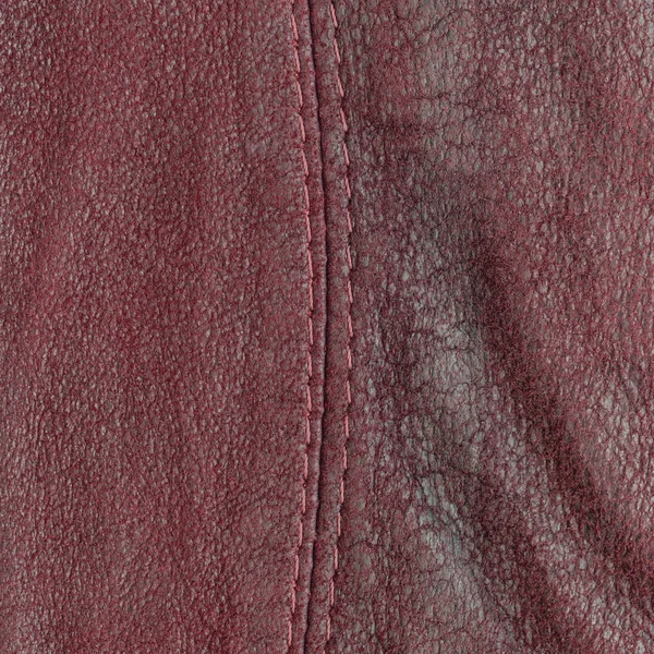 Piros cserzett bőr textúra díszített varrás — Stock Fotó