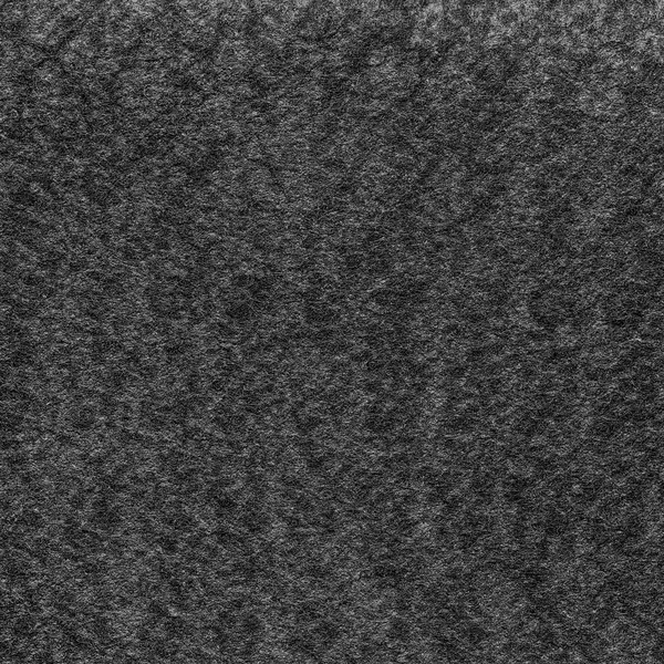 Donker grijze synthetische materiaal textuur als achtergrond — Stockfoto