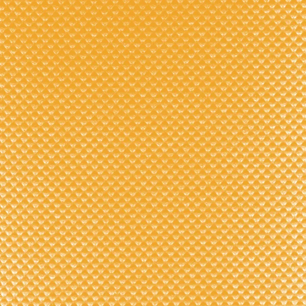 Žluté pozadí s texturou. — Stock fotografie