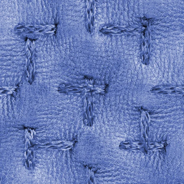 Haute texture détaillée en cuir bleu ornée de points de suture — Photo