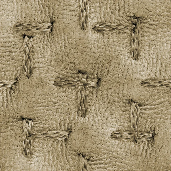 High detailed beige leather texture decorated with stitches — Stock Photo, Image