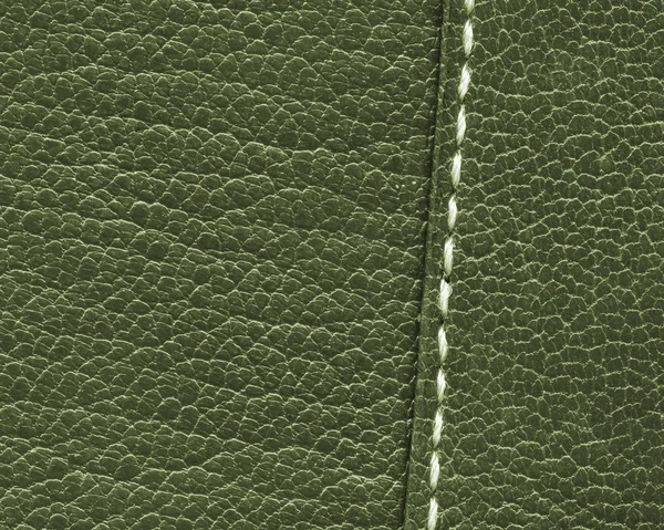 Zelené kožené textury closeup, šev — Stock fotografie