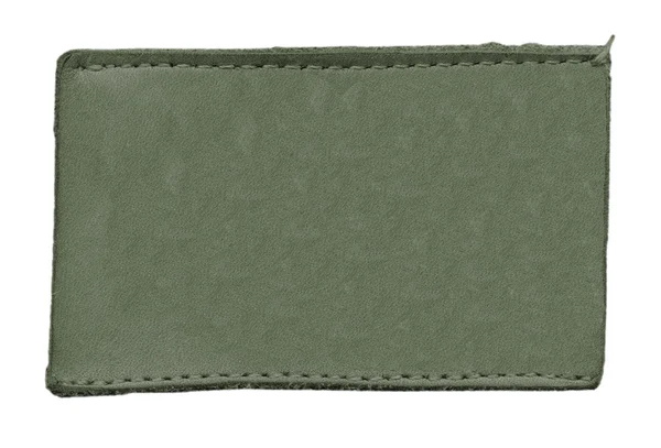 Beyaz arka plan üzerinde izole gri-yeşil deri etiket — Stok fotoğraf