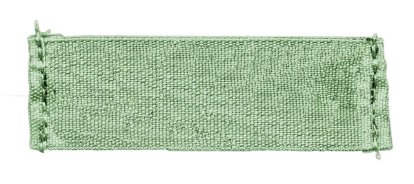 Leere grüne Textilmarke — Stockfoto