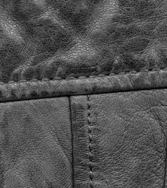 Fragment of black leather — Stock Photo, Image