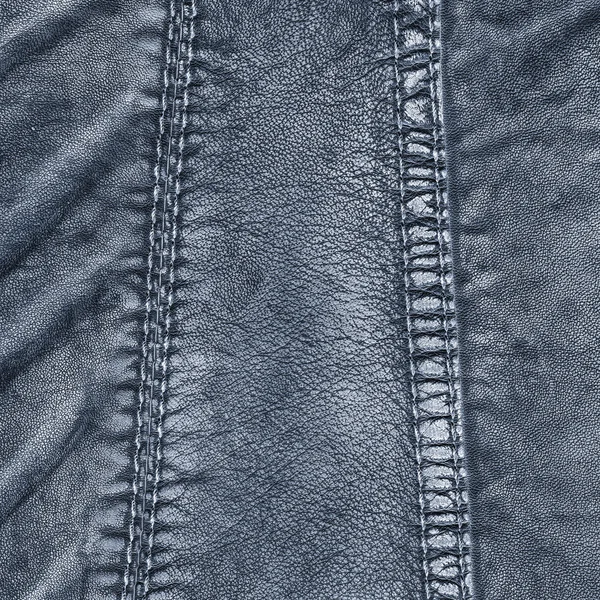 Fragment of blue leather coat — Stock Photo, Image