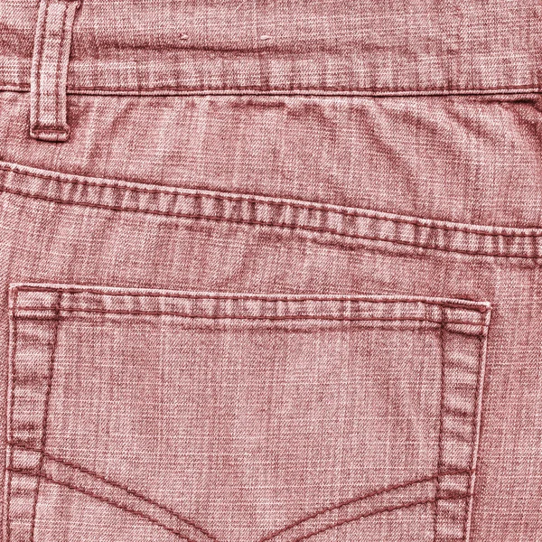 Fragment einer roten Jeans — Stockfoto