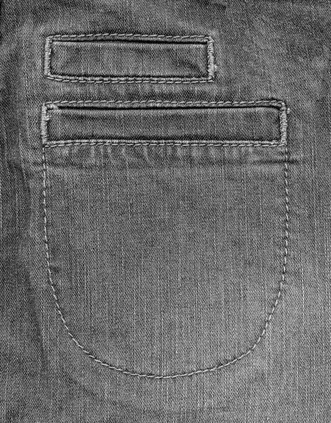 Фрагмент серых джинсовых брюк — стоковое фото