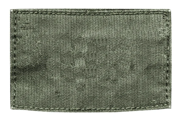Etiqueta de tecido verde em branco — Fotografia de Stock
