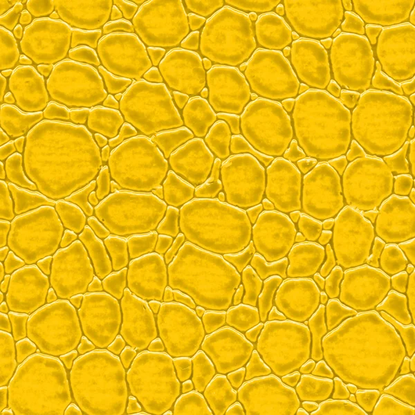 Textura de pele de réptil artificial amarelo — Fotografia de Stock