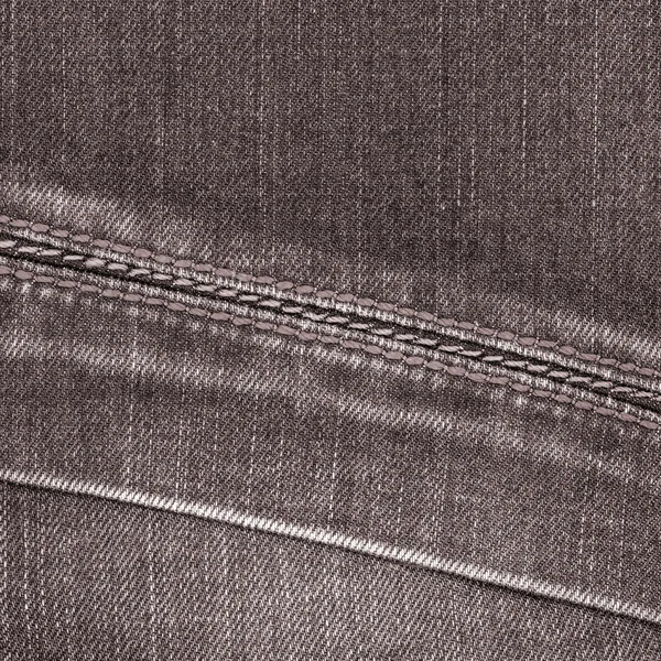Коричневая текстура джинсов — стоковое фото