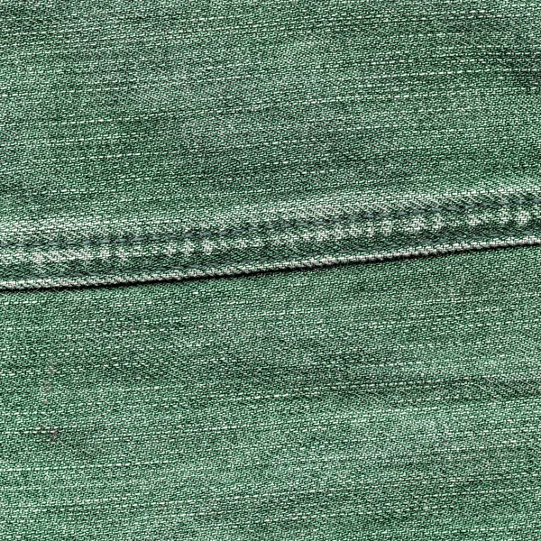 Textura de ganga verde, costura . — Fotografia de Stock