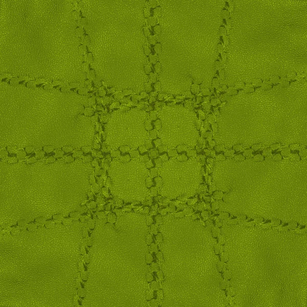 Groene achtergrond op basis van leder texture en naden — Stockfoto