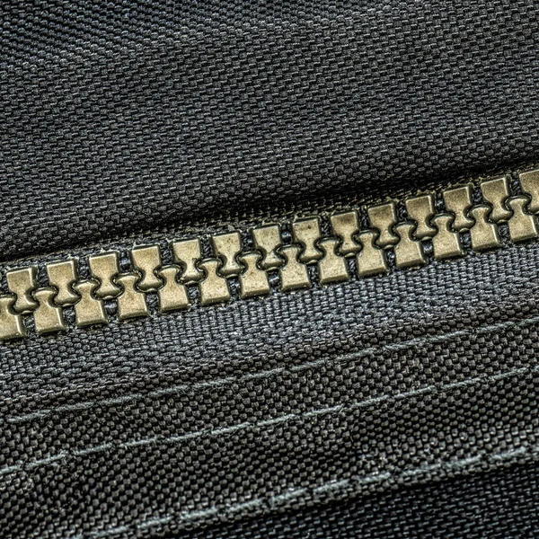 Black textile texture, zipper — Stock Photo, Image