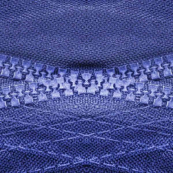 Blue background based on textile texture and zippers — Stock Photo, Image