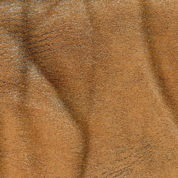 Желто-коричневая текстура кожи крупным планом — стоковое фото