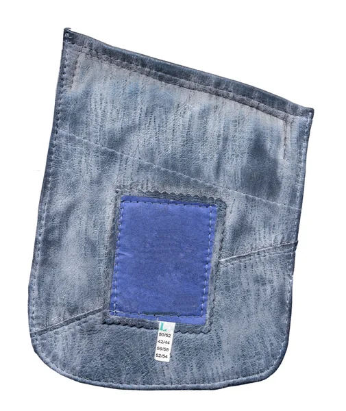 Bolso azul de jaqueta de couro com etiqueta no branco — Fotografia de Stock