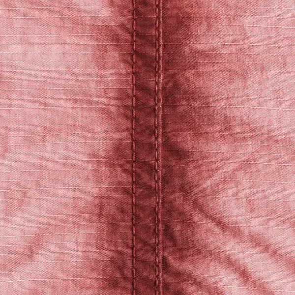 Kırmızı kumaş dokusu, dikiş — Stok fotoğraf
