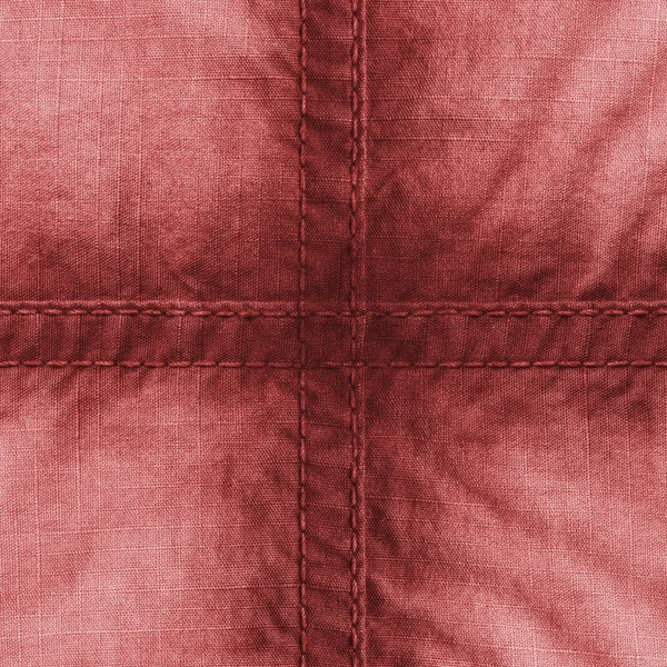 Textura de tecido vermelho, costuras, cruz — Fotografia de Stock