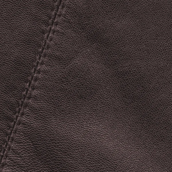 Dark brown leather texture, seam — Stock Photo, Image