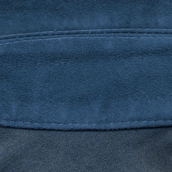 Hintergrund aus zwei Arten von blauem Leder, Nähte — Stockfoto