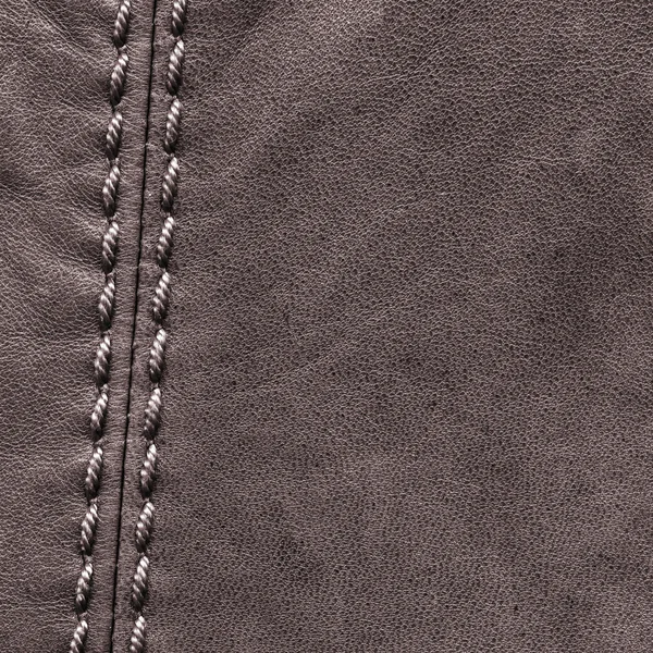 Dark brown leather texture, seam — Stock Photo, Image