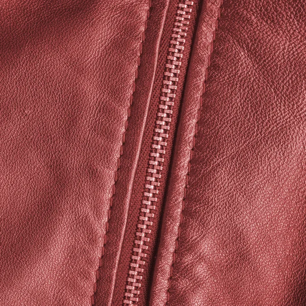 Red leather texture, zipper — Stock Photo, Image