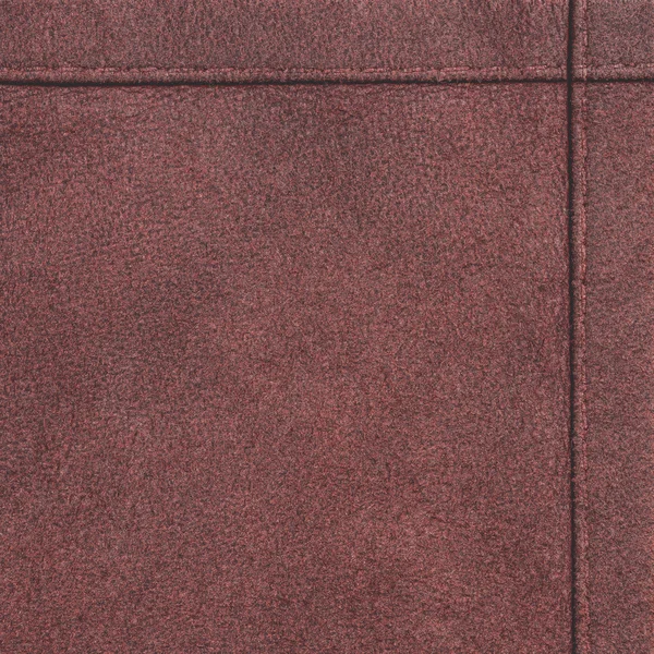 Cuir brun-rouge texture gros plan, coutures Photo De Stock
