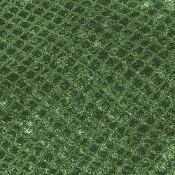 Зеленая искусственная кожа змеи крупным планом — стоковое фото