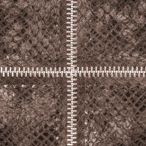 Brown artificial snake skin texture closeup, zippers — Stock Photo, Image