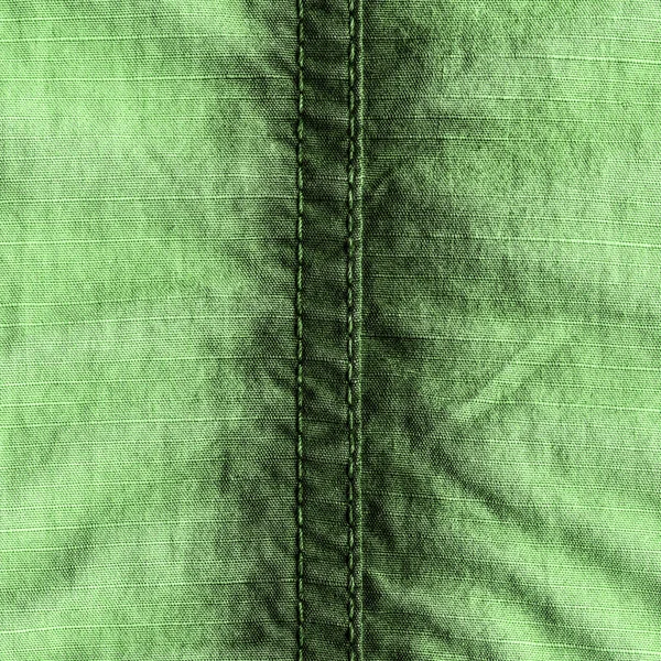 Texture tessuto verde, cucitura — Foto Stock