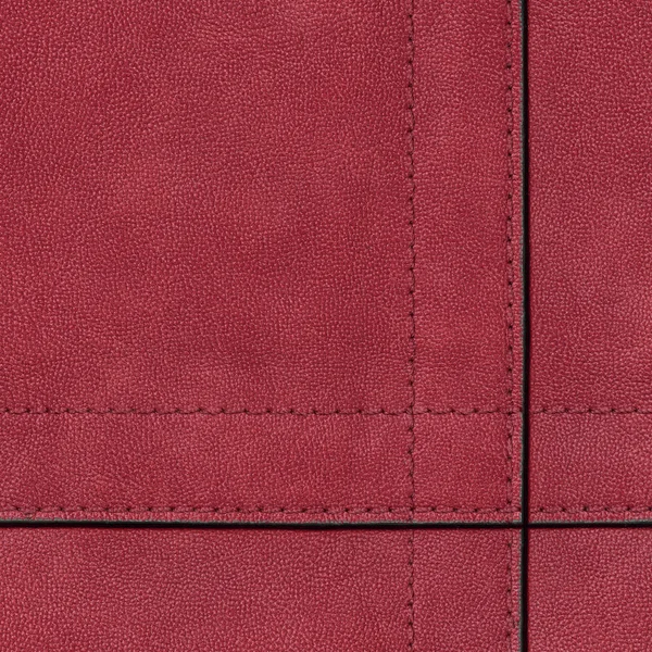Rött läder textur, sömmar, sy — Stockfoto