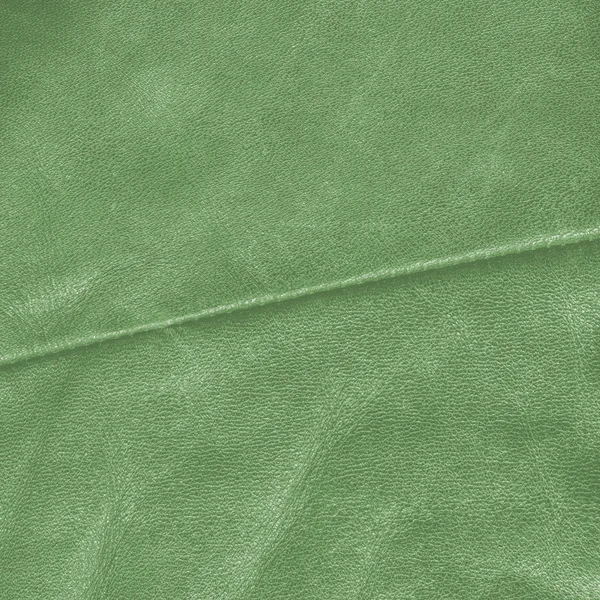 Sfondo in pelle verde, cuciture — Foto Stock