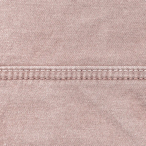 Soluk kırmızı kot doku, dikiş — Stok fotoğraf