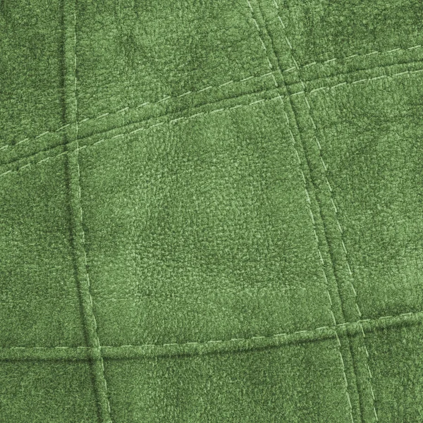 Green leather background, seams — Stock Photo, Image