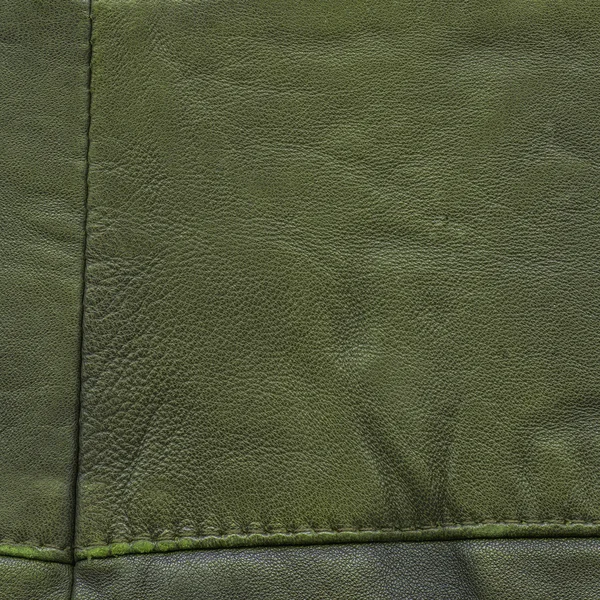 Arka plan olarak eski ve yıpranmış yeşil deri doku — Stok fotoğraf