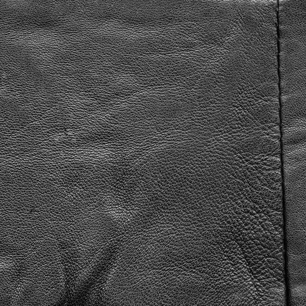 Textura de couro preto velho como fundo, costura — Fotografia de Stock