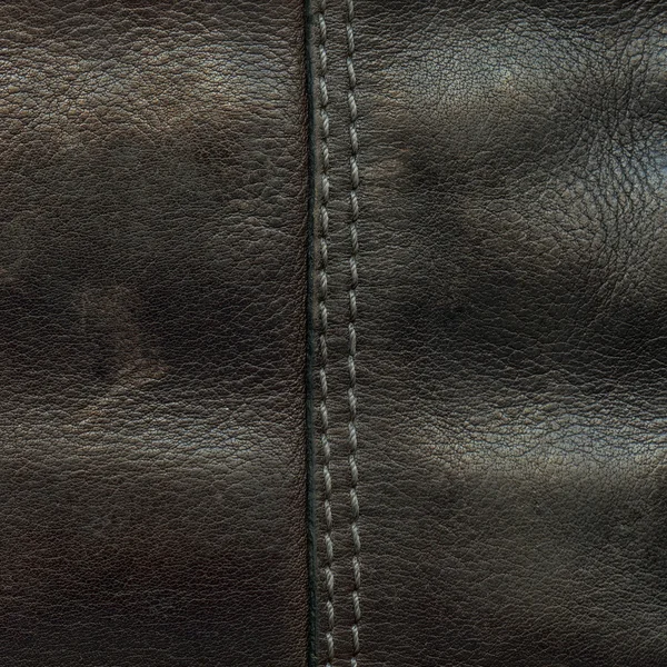 Textura de couro marrom, costura. — Fotografia de Stock