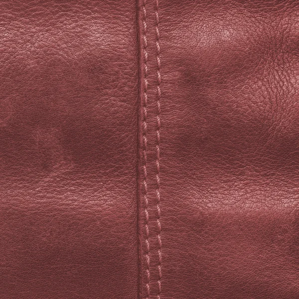 Red leather texture, seam. Can be used as background — Stock Photo, Image