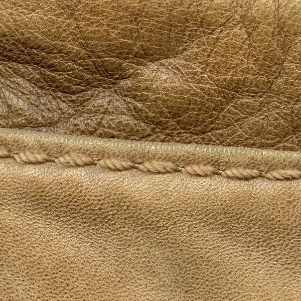Fundo de dois tipos de couro marrom, costura — Fotografia de Stock