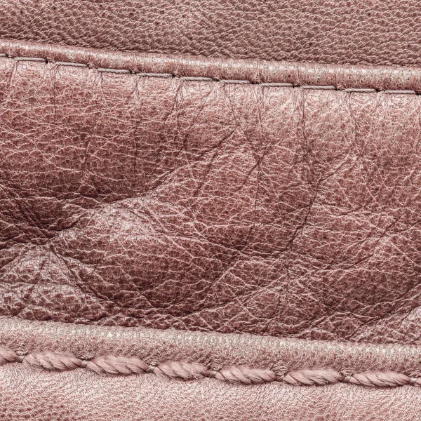 Red-bown leather texture closeup, seams, stitch — Stock Photo, Image