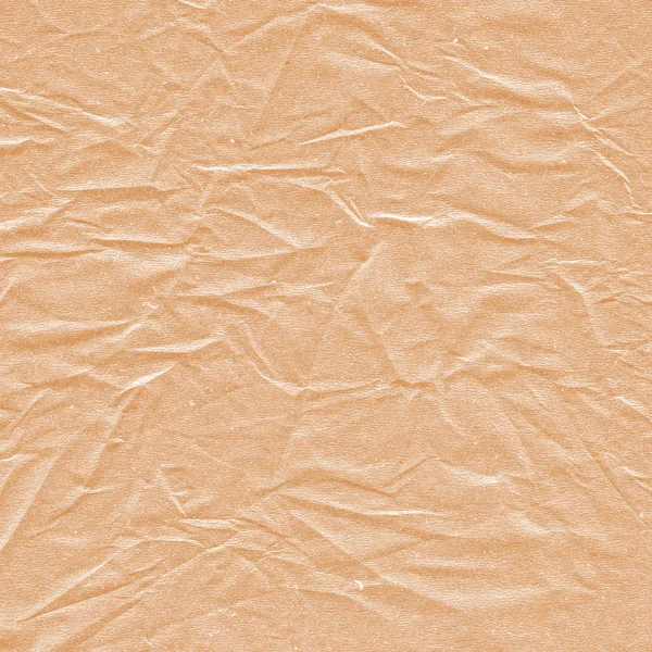 Yellow crumpled packing paper background — Stock Photo, Image