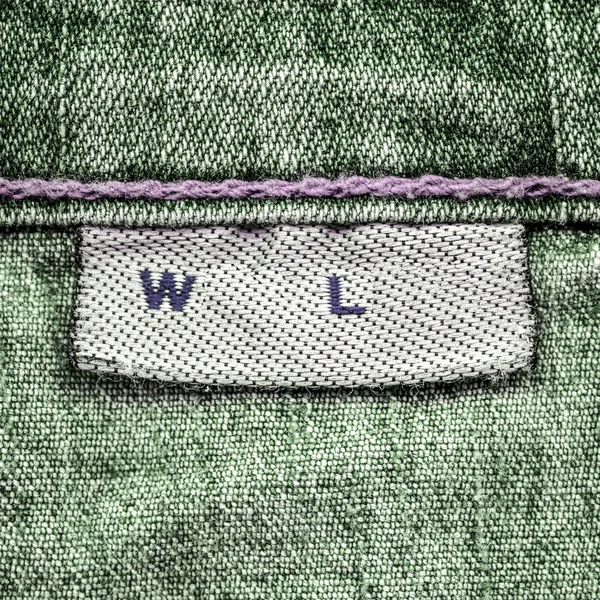 green jeans texture, blank textile label