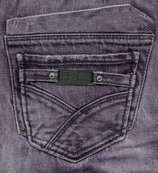 Calças de ganga violeta para trás pocke — Fotografia de Stock