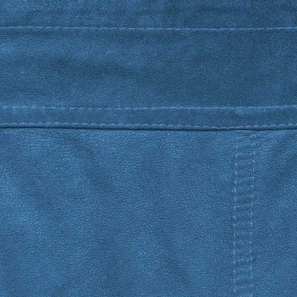 Skórzane niebieskie tło ozdobione szwy — Zdjęcie stockowe