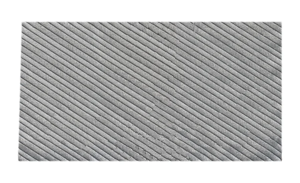 Etiqueta textil gris en blanco aislada en blanco —  Fotos de Stock